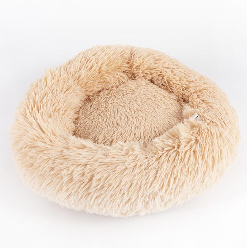 Plush round pet bed for small dog comfort and sleep