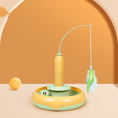 Self-play cat toy with track, spinner, and feather attachment