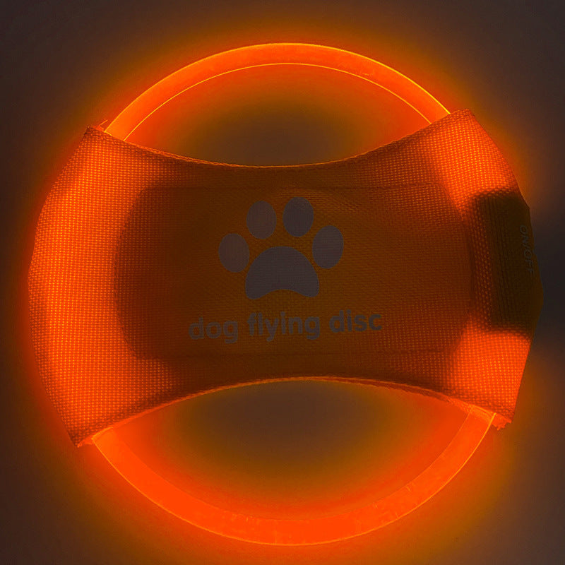 Bright LED illuminated flying disc for dogs outdoor play
